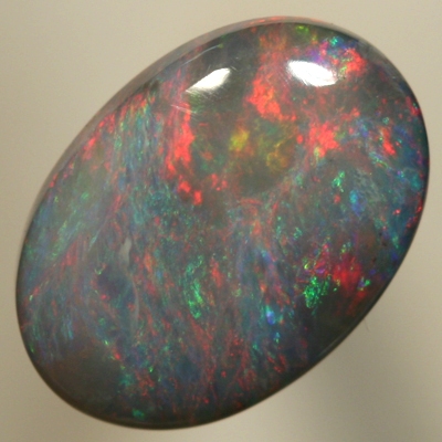 SOLID BLACK OPAL Strong burning red over green